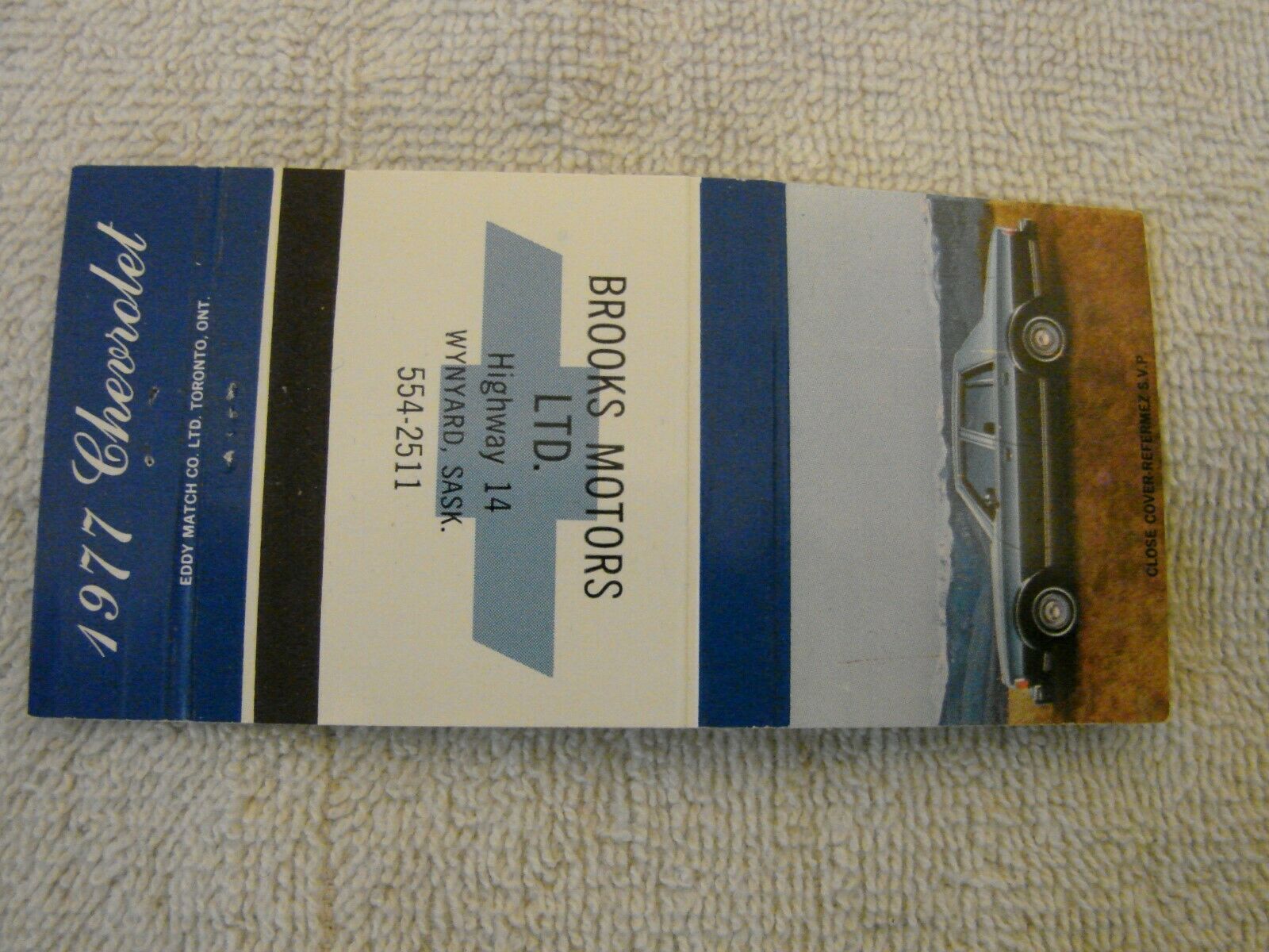 1977 CHEVROLET MATCH BOOK COVER WITH CAR GRAPHICS BROOKS MOTORS WYNYARD SASK.